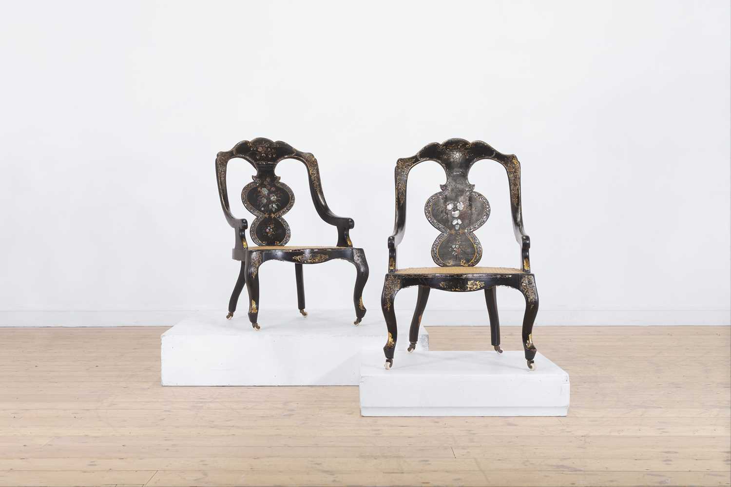 A pair of Victorian papier mâché chairs,