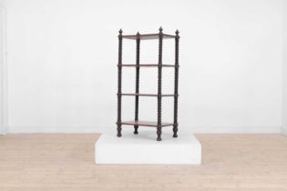 A cherrywood etagere,