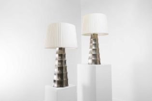 A pair of modernist metal table lamps,