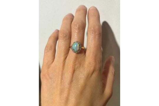 An 18ct gold opal and diamond cluster ring, - Image 5 of 5