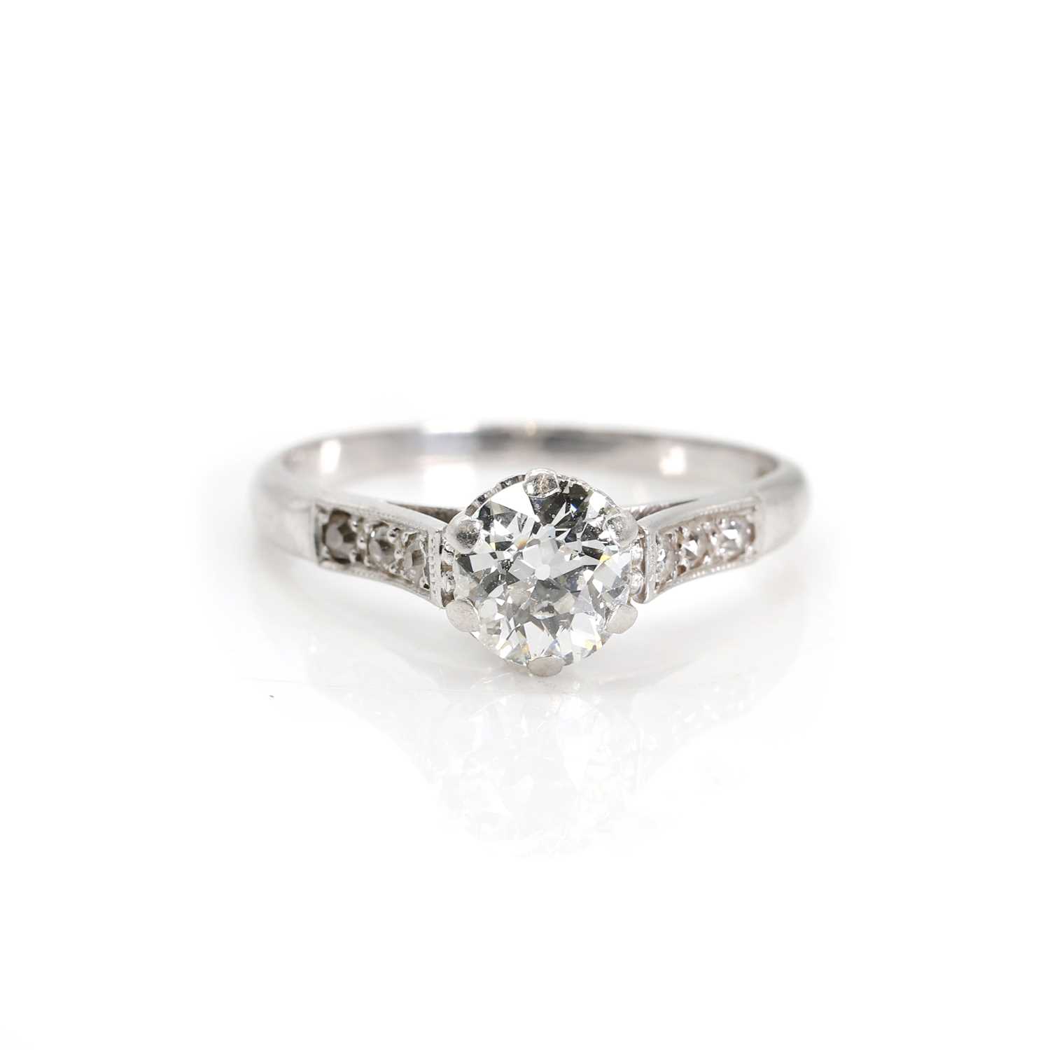 A platinum and diamond single stone ring,