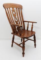 A 19th century lathe back chair - in beech, elm and satin walnut, with a pierced splat and slat
