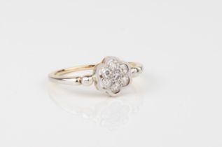 A matching mid-century 18ct yellow gold, platinum and diamond floral cluster ring - halo set with