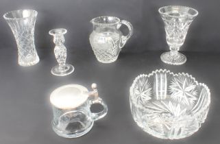 A small collection of cut glass - including a Stuart candlestick, 15.75cm. high; a pewter mounted