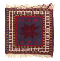 A woollen prayer mat from Jerusalem, circa 1939-45 - 40 x 39cm.
