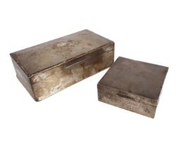 Two hallmarked silver cigarette boxes: 1. engine-turned top with vacant cartouche, the front