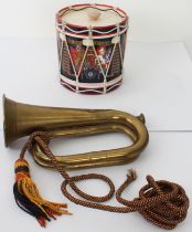 A vintage brass cadet bugle - with braided cord, 28cm. long; together with a regimental