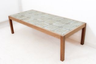 A 1970s retro tile-top coffee table - the large rectangular top inset with three rows of seven