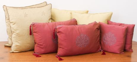 Two pairs of wine red silk cushions with mulberry tree style embroidered decoration - the larger