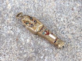 An Egyptian revival sarcophagus novelty propelling pencil - in gilt white and rose metal with enamel