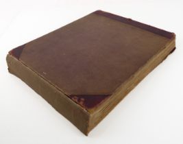 A Victorian leather bound postcard and photograph album (requires restoration).