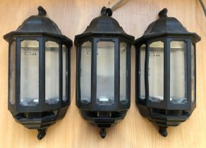 Three black half-lantern outside lights by ASD Lighting - the crackle finish polycarbonate