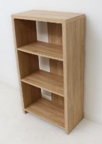 A modern light-oak-effect open bookcase - (LWH 60 x 31.25 x 108.5cm.)