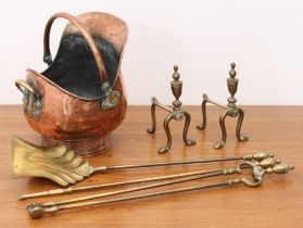 A pair of early 19th century style brass fire dogs or andirons - with urn finials and pad feet,