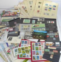 A quantity of British and German mint stamps, including 1990s GB Mint Stamp sets - together with a