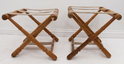A pair of turned beech wood luggage stands - mid-20th century, with copper nailed canvas webbing. (