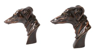 A pair of bronze greyhound heads (20 cm high).