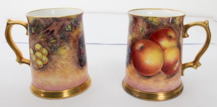 A pair of Royal Worcester fruit painted tankards by Gerald Delaney - both painted with fallen