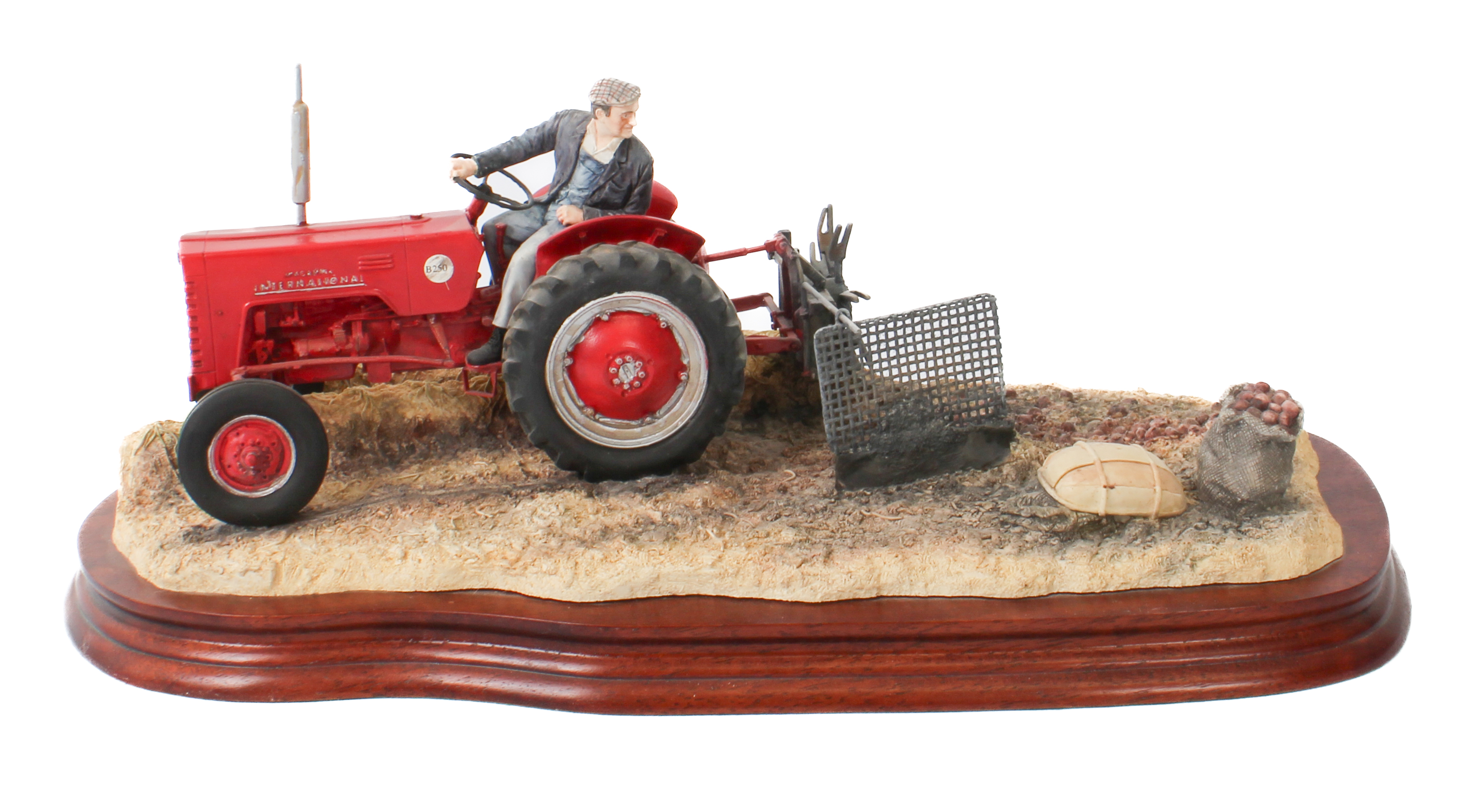 A Border Fine Arts limited edition model, 'Lifting the Pinks (International B250 Tractor)' with