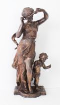 A classical-style bronze of a female figure with putto (47 cm high).