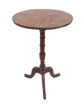 Three pieces: 1. an early 19th century mahogany tripod table - the circular top on a turned column