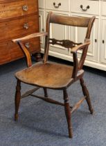 A 19th century beech and elm scullery elbow chair