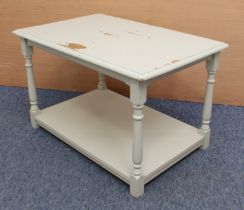 A small pale-grey-painted two-tier coffee table - the moulded top raised on slender turned