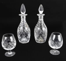 A matched pair of cut glass mallet decanters - one by Webb Corbett, 'Georgian' pattern, 29.5cm.