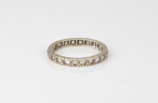 A 9ct white gold and white sapphire full eternity ring - stamped '9CT', size K½.