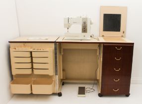 A Bernina Matic 910 Electronic sewing machine in a fitted mahogany cabinet - 1980s, the machine on a