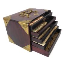 A Chinese bone and bamboo Mah Jong set in a mother-of-pearl inlaid and brass bound hardwood box -