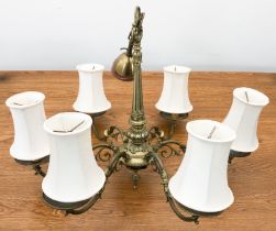 A six-light brass chandelier or ceiling light fitting - with six reeded, foliate scroll arms issuing
