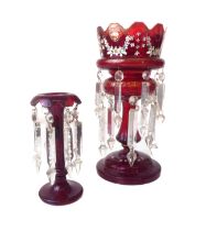 A Victorian enamelled ruby glass table lustre - the crown-form top on a baluster stem to a domed,