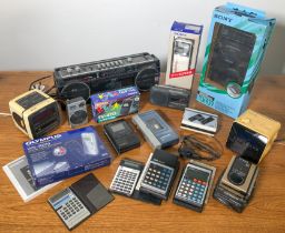 A collection of vintage 1980s-90s personal electronics - including a boxed Sony FD-2B Watchman