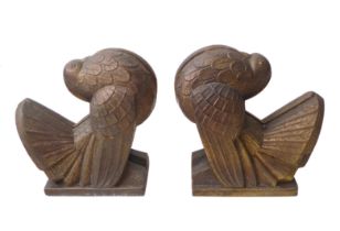 A pair of Art Deco gilt spelter bookends in the form of stylised doves - 15cm. high.