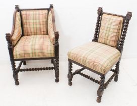Two late 19th century carved oak chairs comprising an armchair and matching side chair - the