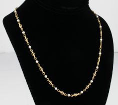 A vintage 9ct yellow gold and cultured pearl necklace - stamped '9K', the fancy links alternating