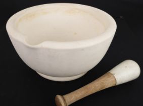A large and heavy ceramic pestle and mortar - stamped 'Warranted Acid Proof' to base, with pouring