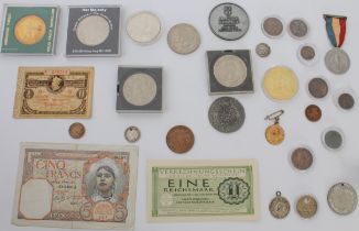 A small collection of coins, medals and commemoratives - including a WW1 1918 City of Duren 10