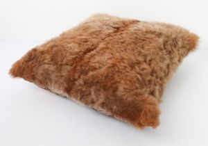 A custom made Welsh Organic Tannery goatskin cushion, the back with reindeer head fabric (49 x 49
