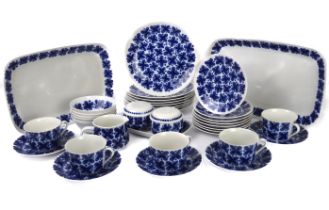 A selection of Rőrstrand (Sweden) china in the Mon Amie pattern comprising 8 x 25 cm plates (one