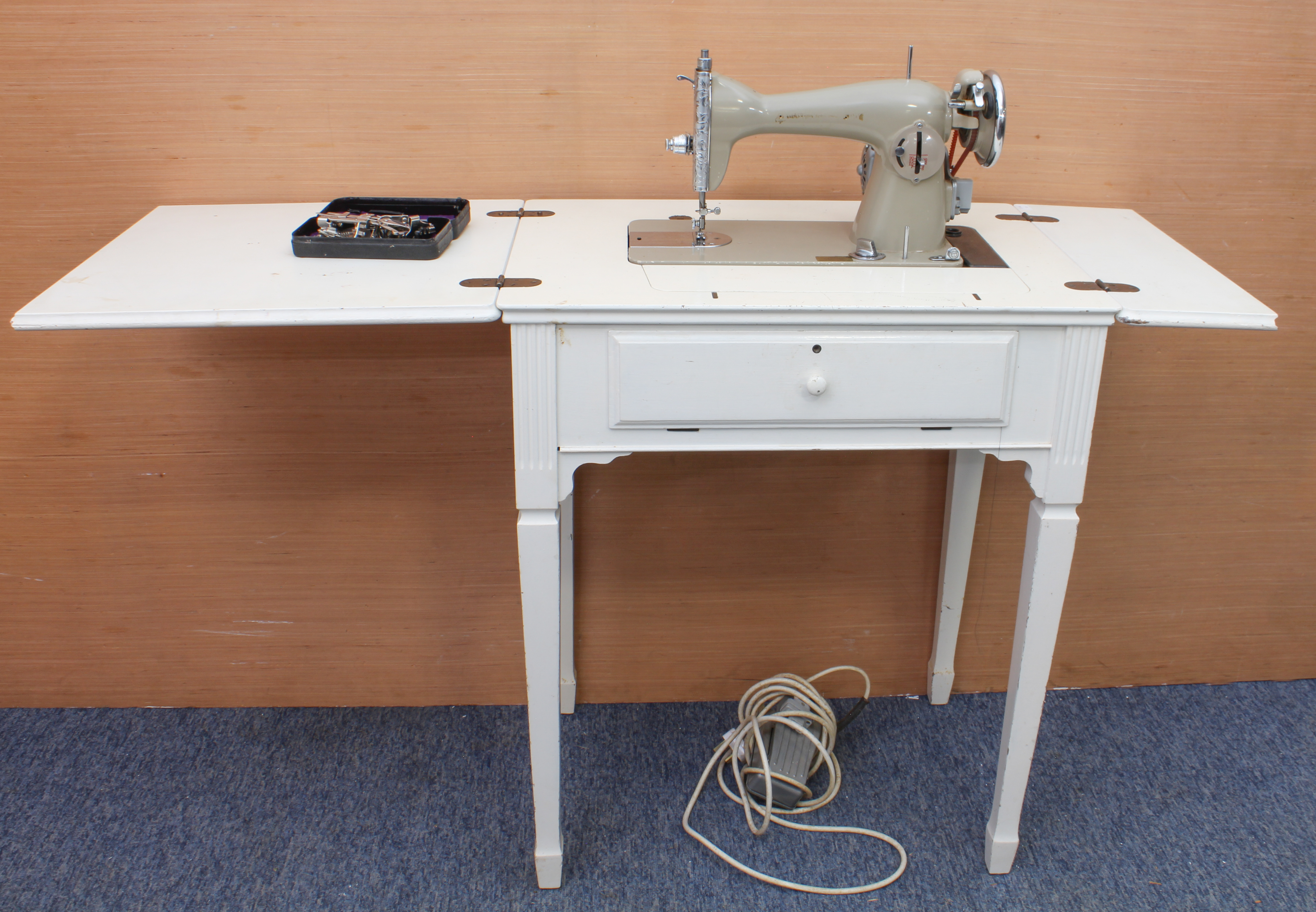 A vintage 1950s-60s sewing machine, probably by Nelco - with YM-40 motor and YN-40 Foot