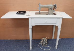 A vintage 1950s-60s sewing machine, probably by Nelco - with YM-40 motor and YN-40 Foot