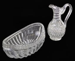 A fine quality Victorian cut glass claret jug: the heavy glass jug with strawberry diamond,