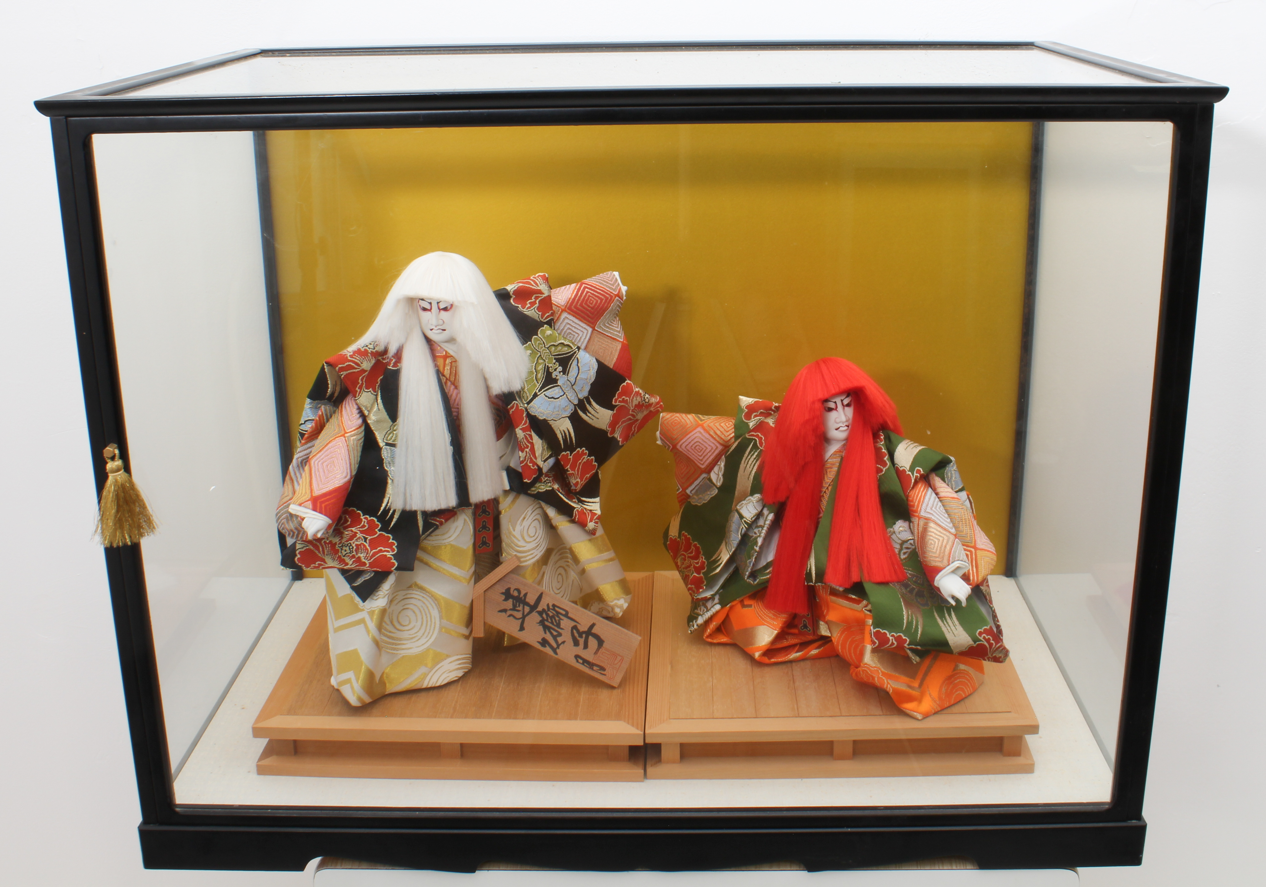 A cased pair of Japanese dolls depicting Ren Jishi actors by Kyugetsu of Tokyo - second half 20th