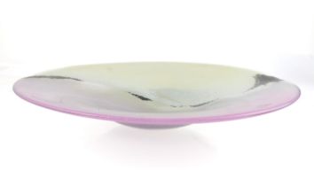 A large art glass bowl - of flared, shallow form, the heavy glass bowl in pink, cream and black