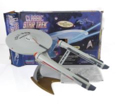 A boxed Star Trek The Next Generation USS Enterprise toy by Playmates, Bandai - NCC-1701, with