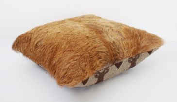 A custom made Welsh Organic Tannery deerskin cushion, the back with reindeer head fabric (49 x 49