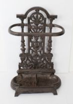 A modern cast iron umbrella stand (50 cm high).