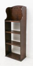 A small 1920s oak bookcase - the top with magazine / sheet-music rack and pierced handle, over